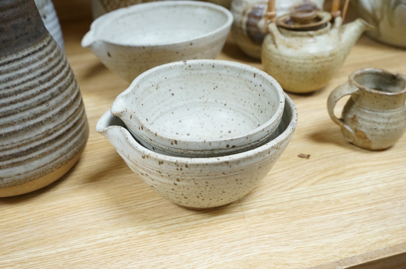 A collection of large Studio pottery vases teapots bowls and tureens (12). Tallest 27cm high